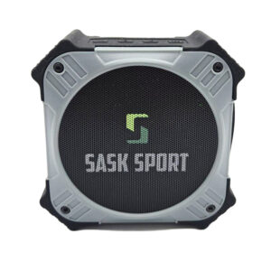 Photo of a four-inch square bluetooth speaker. The speaker is black and grey with the Sask Sport logo on the front.
